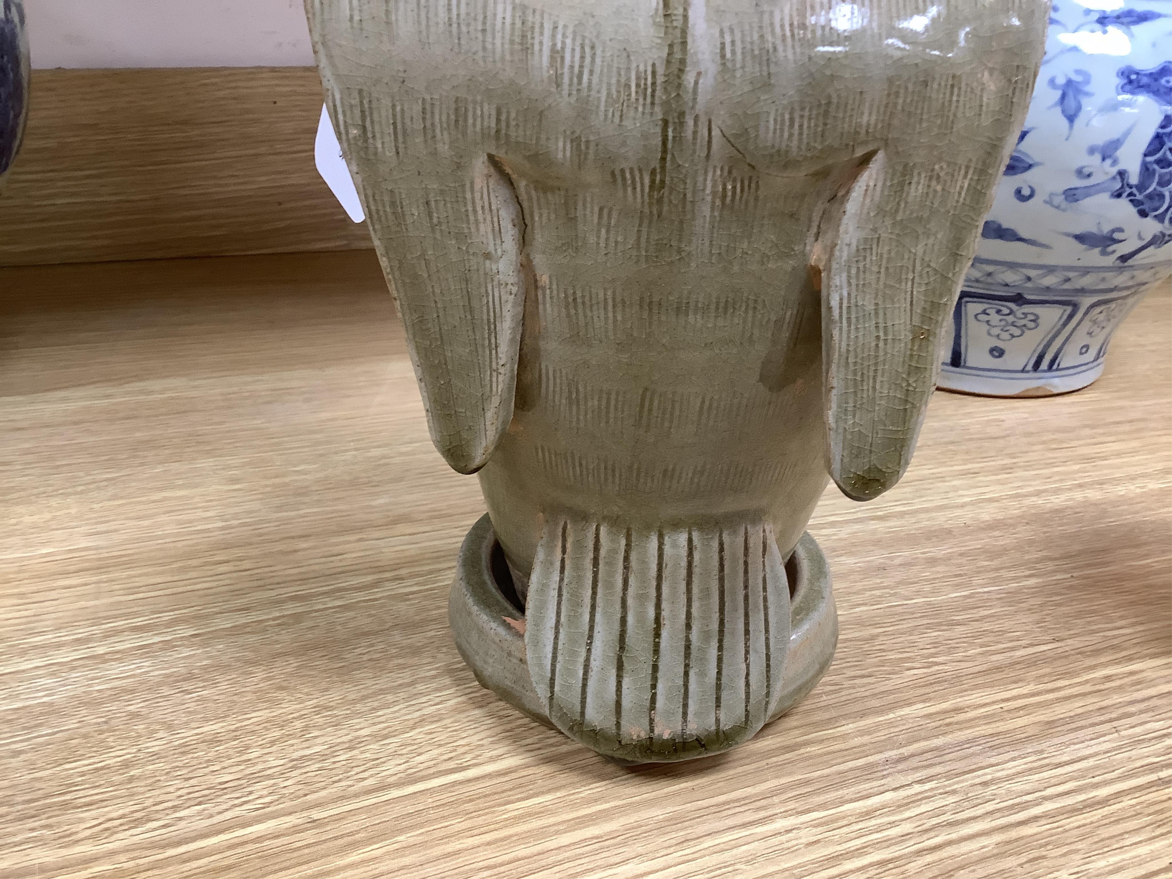 A Korean green glazed bird jar, 33cm high